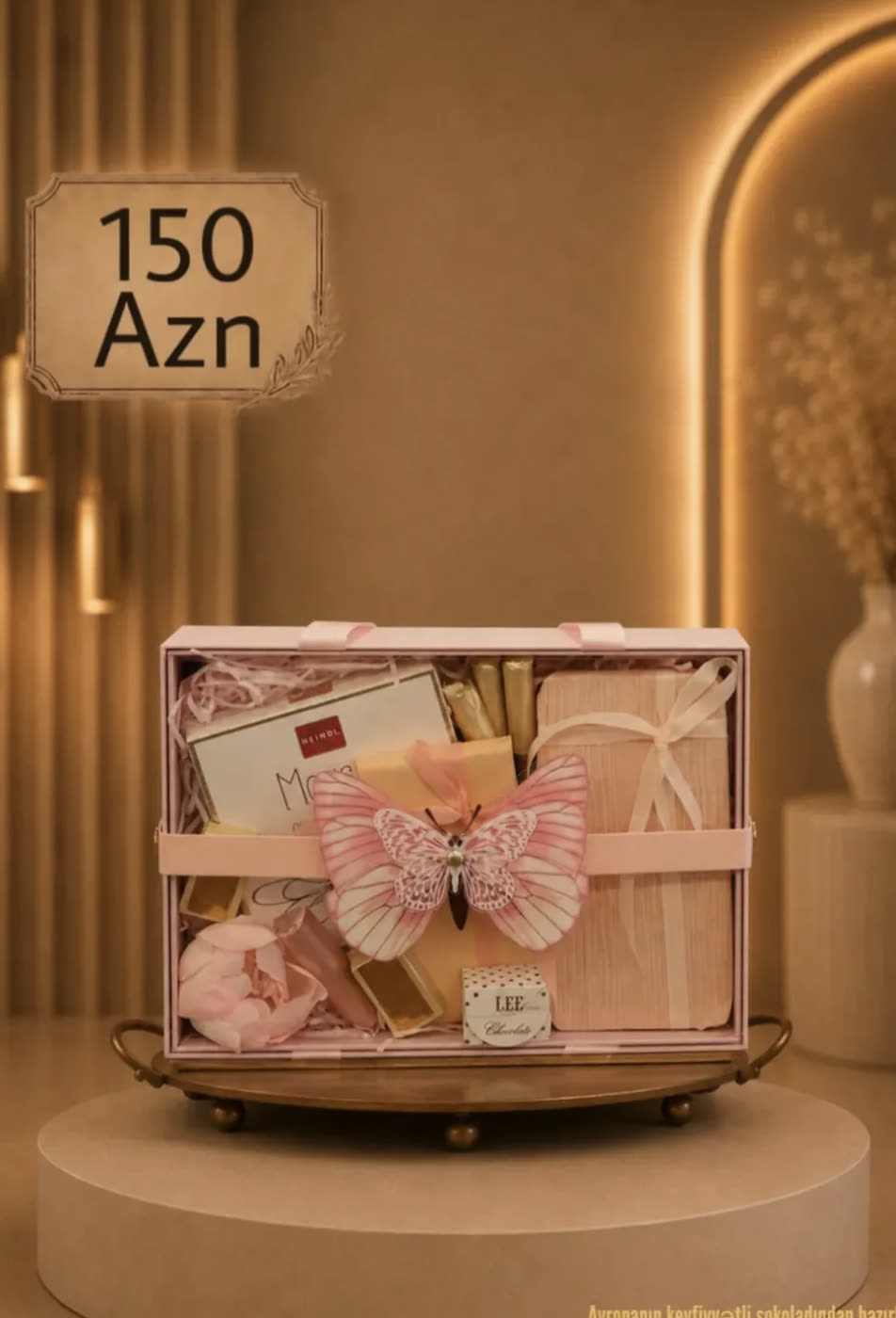 Pink keepsake box with a butterfly, perfume and chocolates